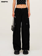 SMFK Wide Leg Parachute Cargo Pants in Black - On Female Model