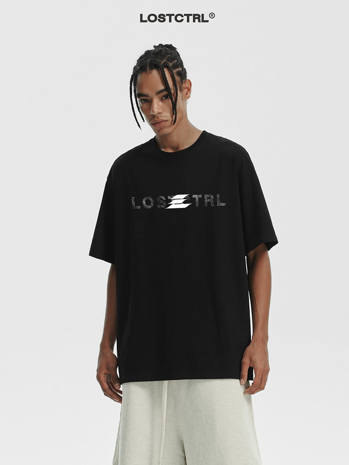 LOSTCTRL Distressed Logo Print Cotton T Shirt in Black - On Male Model