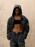 PERSONSOUL Distressed Hooded Denim Jacket in Denim - On Female Model