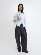RARELY ALIKE Scalloped Peter Pan Collar Blouse in Sky Blue - On Female Model