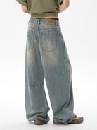 MASONPRINCE Distressed Slub Texture Vintage Jeans in Light Blue - On Model