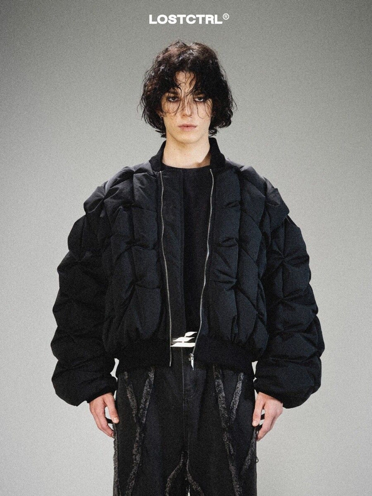 LOSTCTRL Crinkled Down Puffer Jacket in Black - On Model