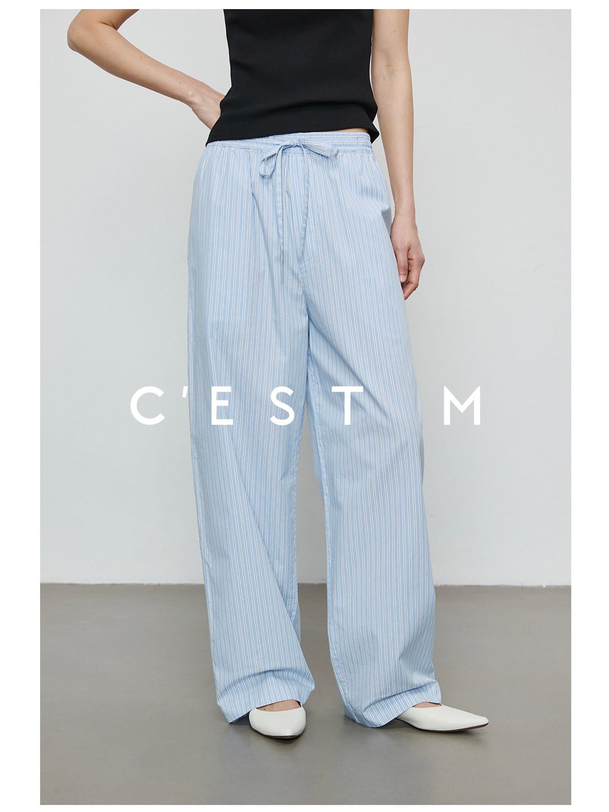 CEST M Striped Pima Cotton Shirt Pants Set in Sky Blue - On Female Model