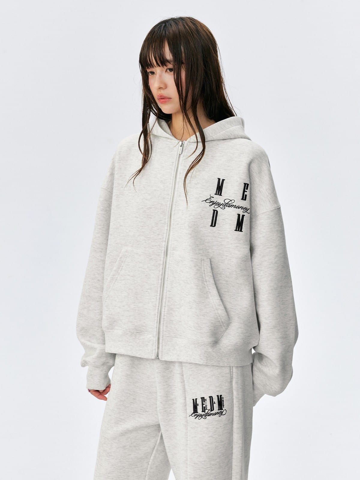 MEDM Embroidered Cotton Blend Zip Up Hoodie in Beige - On Female Model