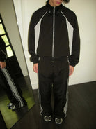 AFterTaste Oversized Zip Up Track Jacket in Black - On Male Model