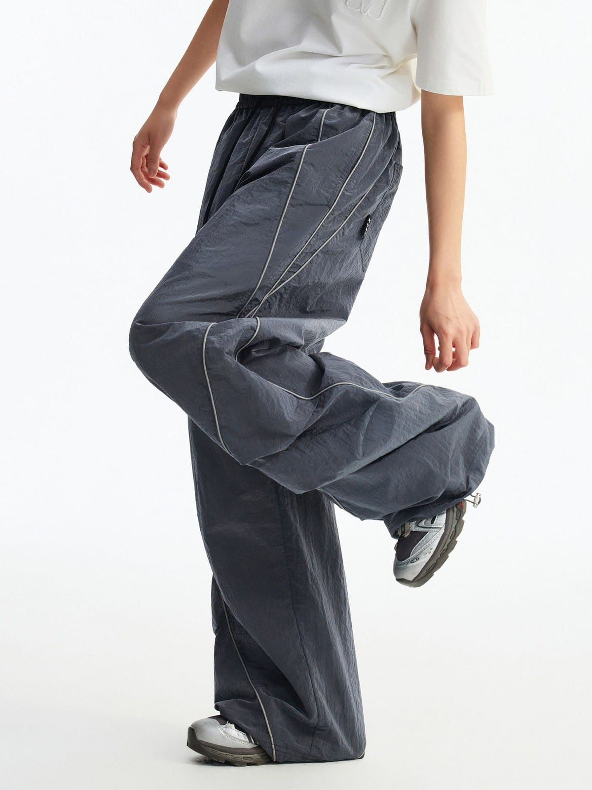 MEDM Glossy Piped Techwear Track Pants in Gray - On Model