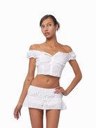 SweetChilling Drawstring Ruffled Mini Skirt in White - On Female Model