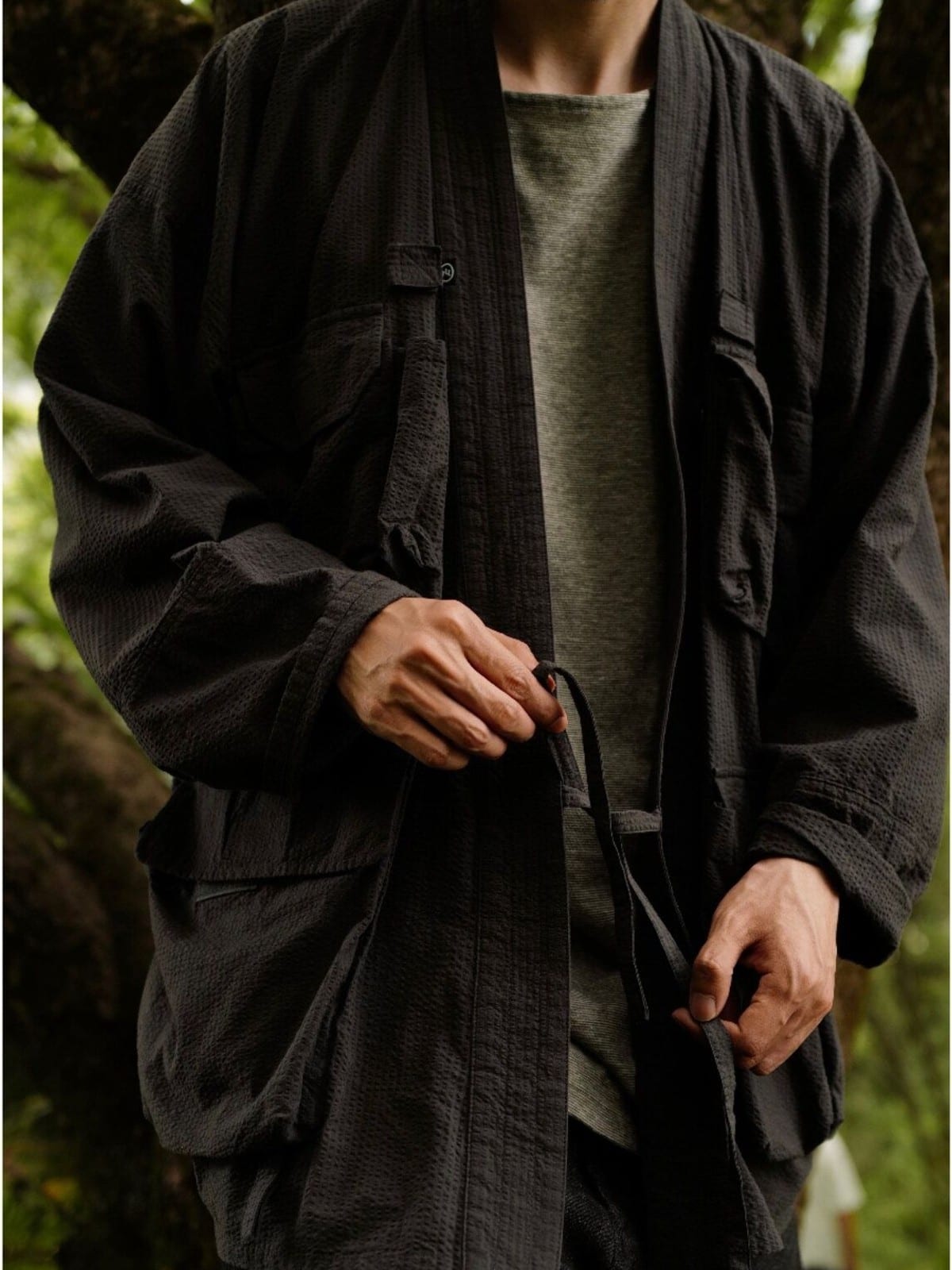 USAGE Reversible Utility Noragi Jacket in Black - On Male Model