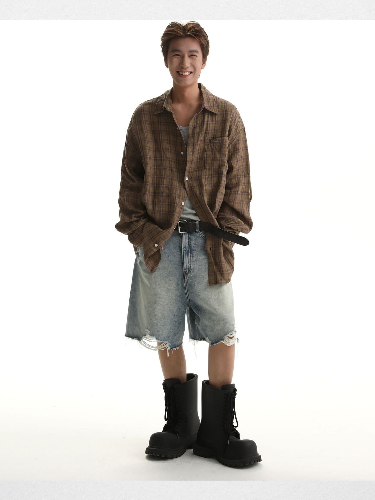 MASONPRINCE Light Wash Raw Hem Denim Shorts in Blue - On Male Model