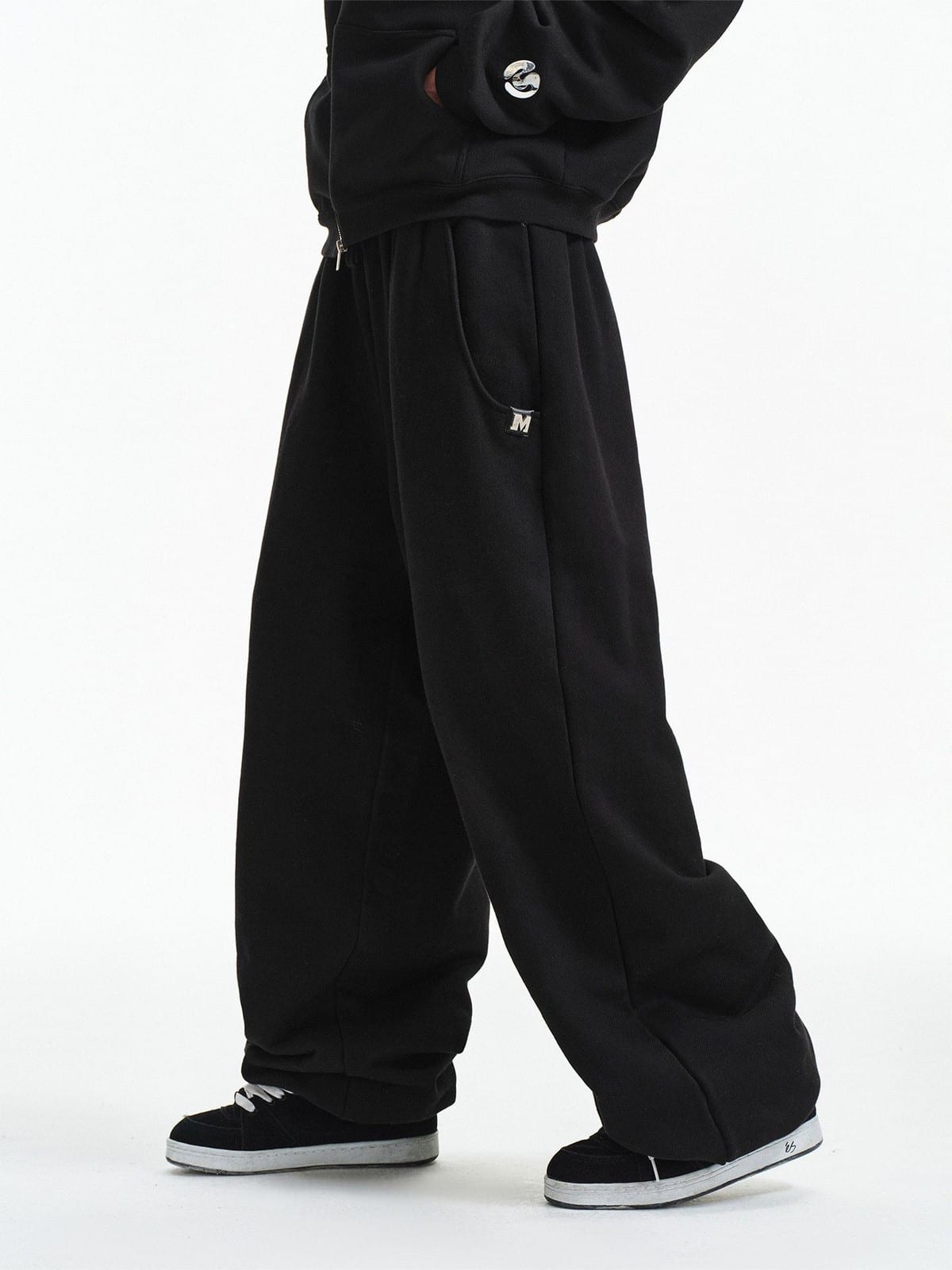 MEDM Cotton Drawstring Sweatpants in Black - On Model