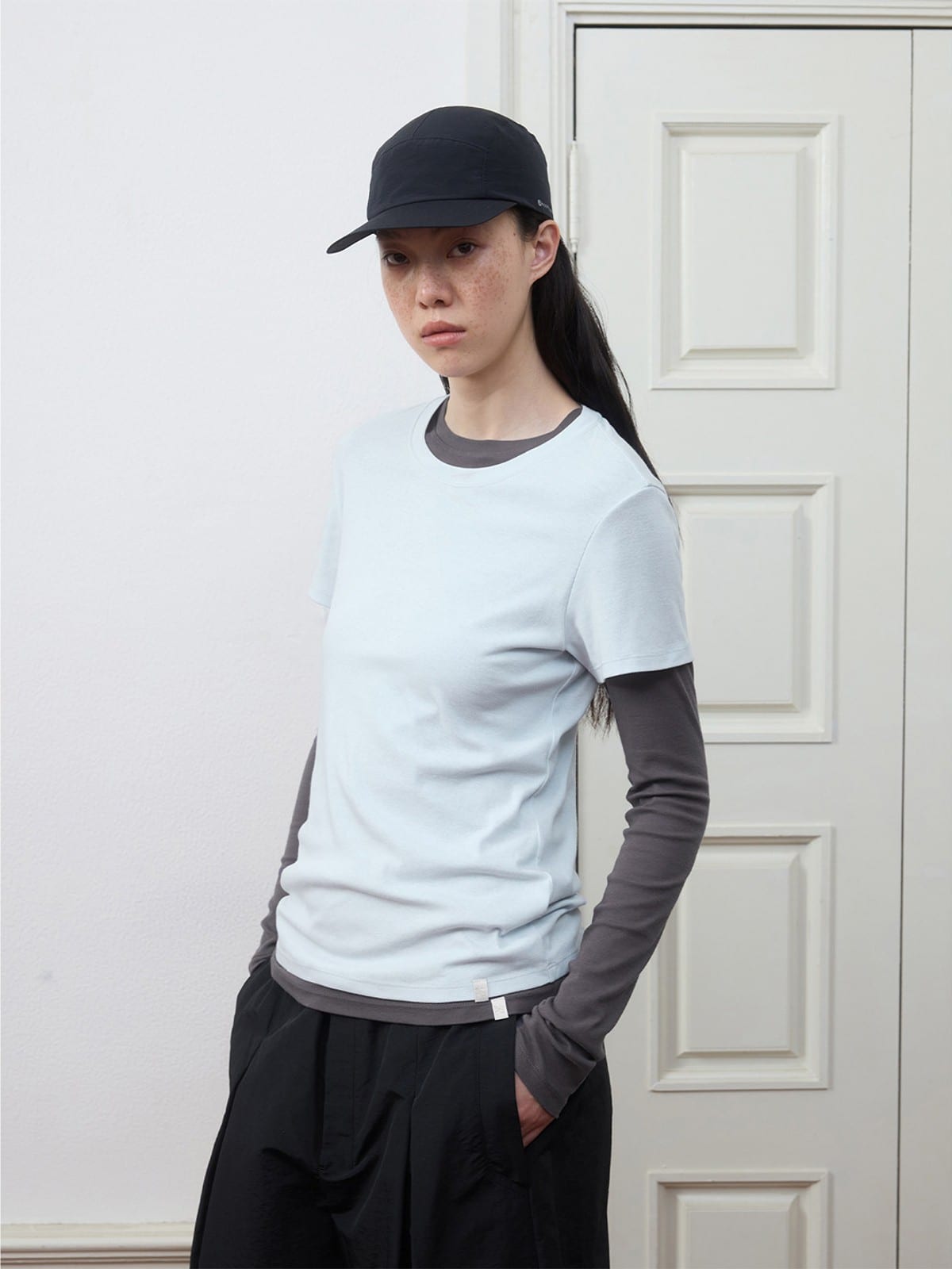 Random Piece Lightweight Cotton Blend Crewneck T Shirt in Sky Blue - On Female Model