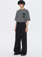 SIMPLE PROJECT Curved Seam Belted Wide Leg Trousers in Gray - On Male Model