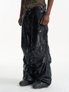 BLINDNOPLAN Faux Leather Layered Cargo Pants in Black - On Male Model