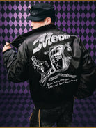 MEDM JoJo Collab Graphic Puffer Bomber in Black - On Male Model