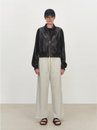MSBEAST Double Zip Cropped Sheepskin Leather Jacket in Black - On Female Model
