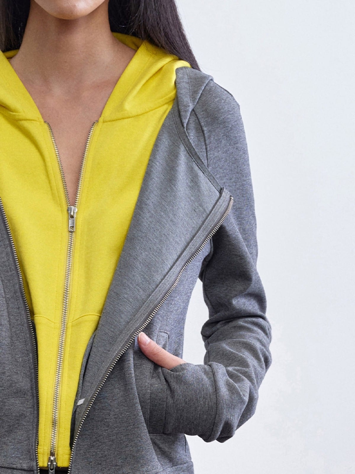 RARELY ALIKE Asymmetric Layered Color Block Hoodie in Dark Gray - On Female Model