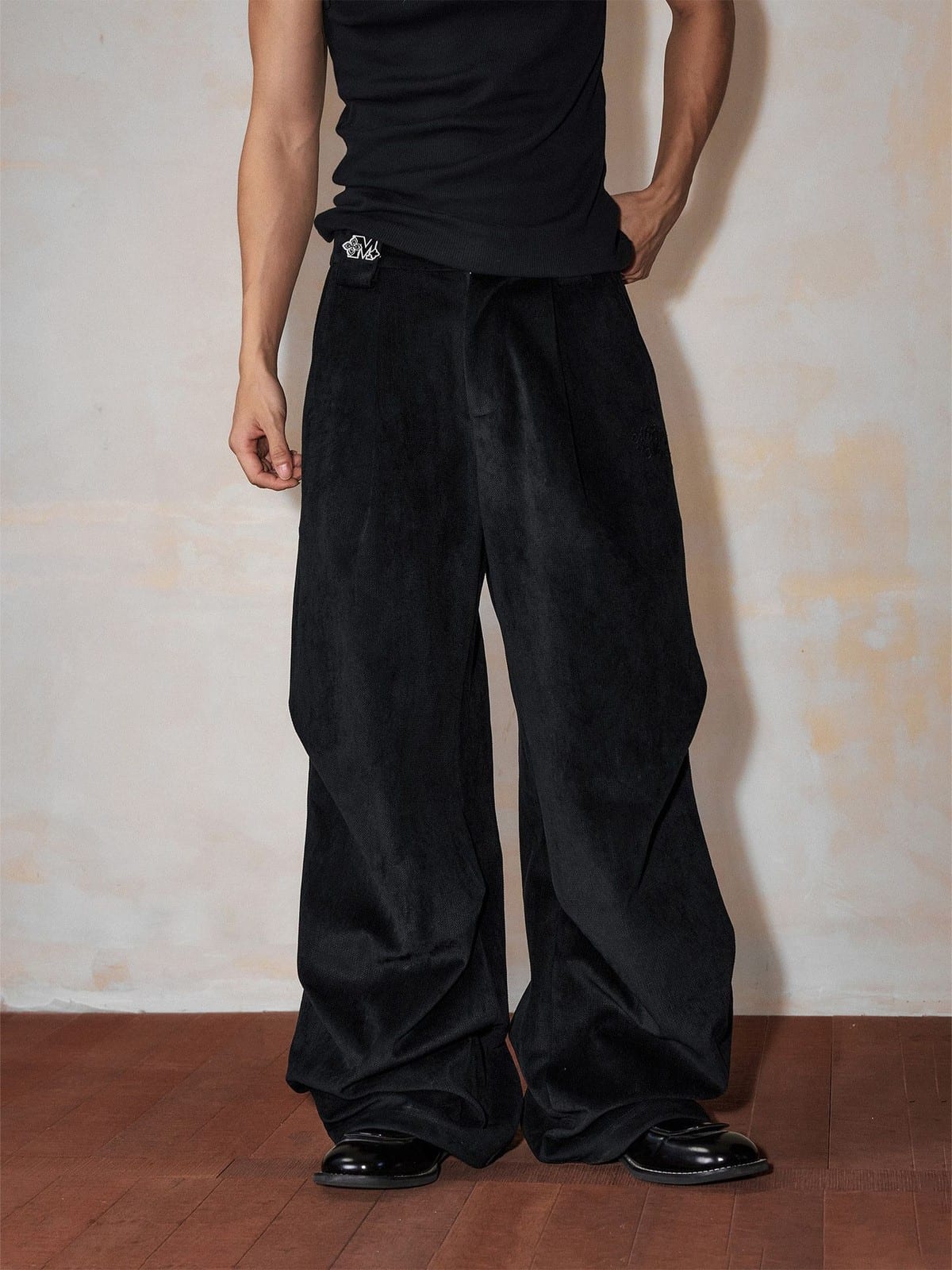 MEDM Wide Leg Parachute Cargo Pants in Black - On Male Model