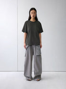 Random Piece Distressed Cotton Blend T Shirt in Gray - On Female Model