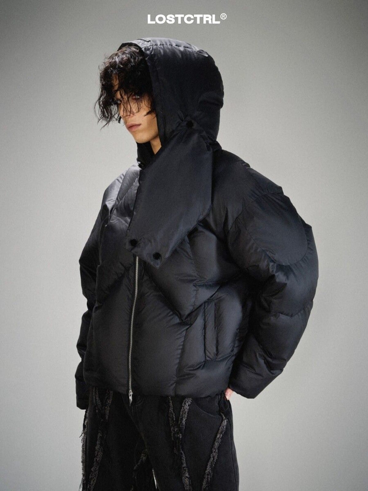LOSTCTRL Duck Down Puffer with Detachable Hood in Black - On Male Model