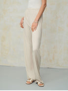 TEASEL Cooling Wide Leg Trousers in Cream - On Female Model