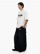 MASONPRINCE Graffiti Logo Cotton T Shirt in White - On Male Model