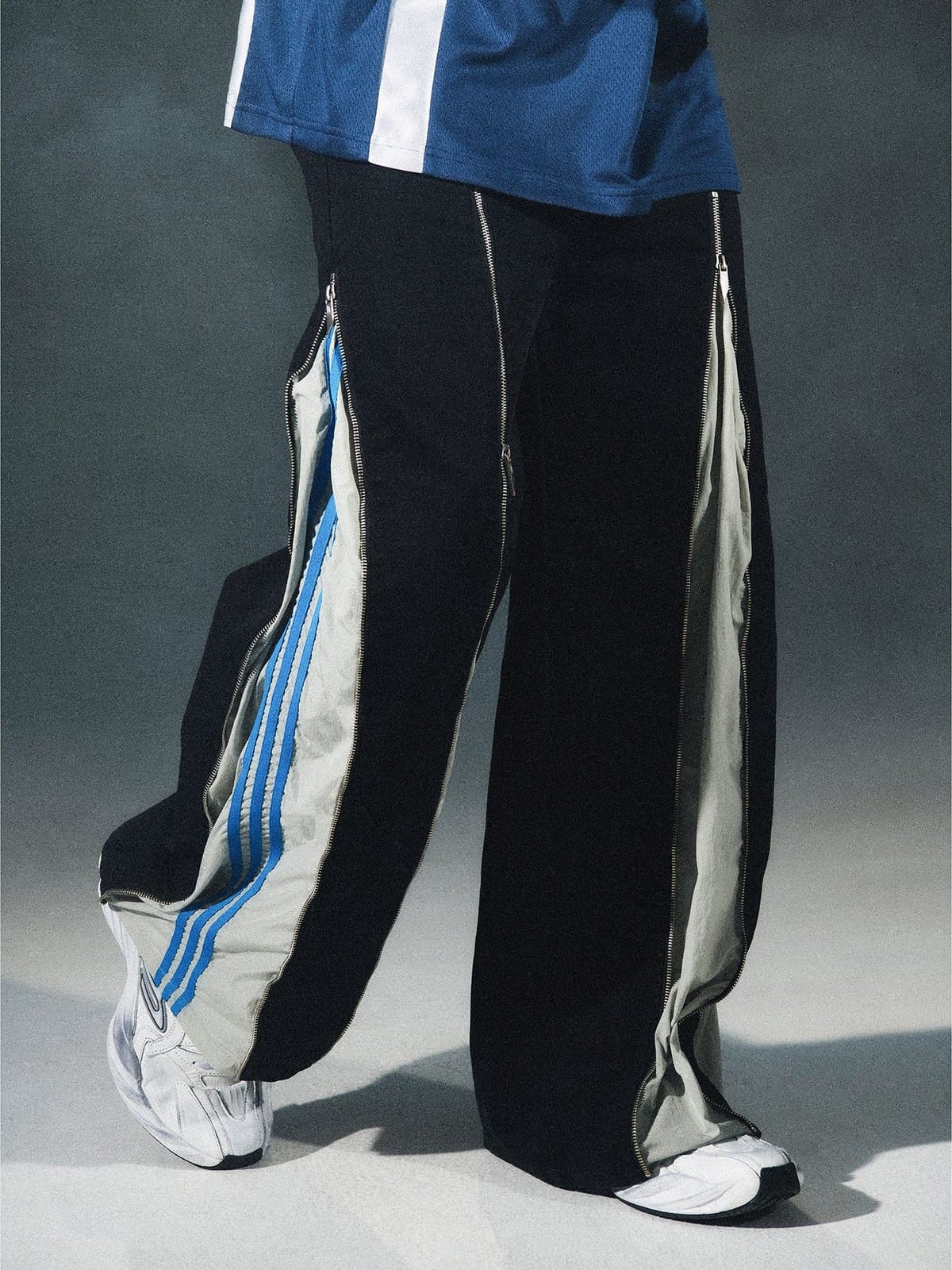 LOSTCTRL Deconstructed Zipper Panel Cotton Pants in Black - On Male Model