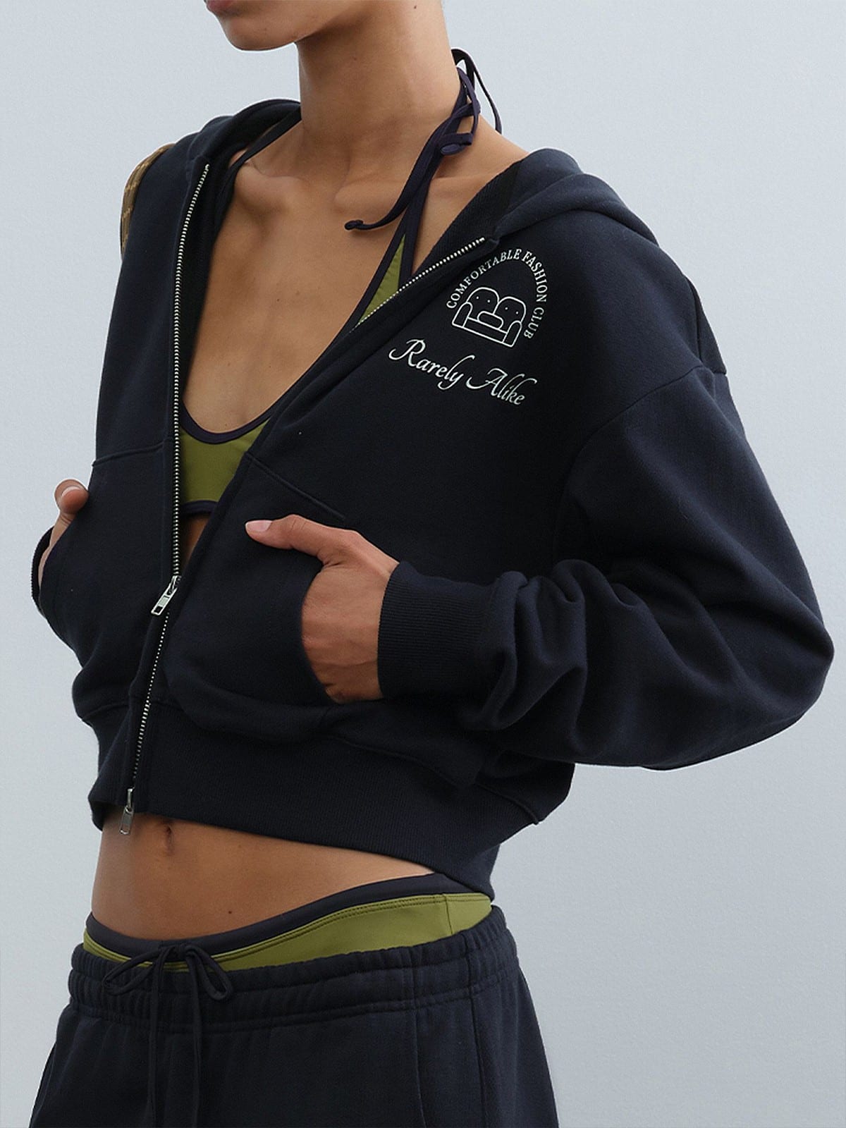 RARELY ALIKE Graphic Cropped Zip Up Hoodie in Navy Blue - On Female Model