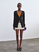 RARELY ALIKE Silk Wool V Neck Backless Cardigan in Black - On Female Model
