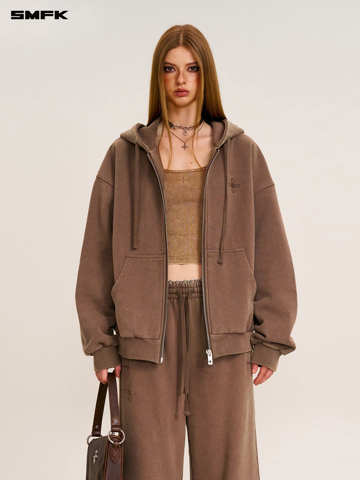 SMFK Cross Embroidered Cotton Zip Up Hoodie in Brown - On Female Model
