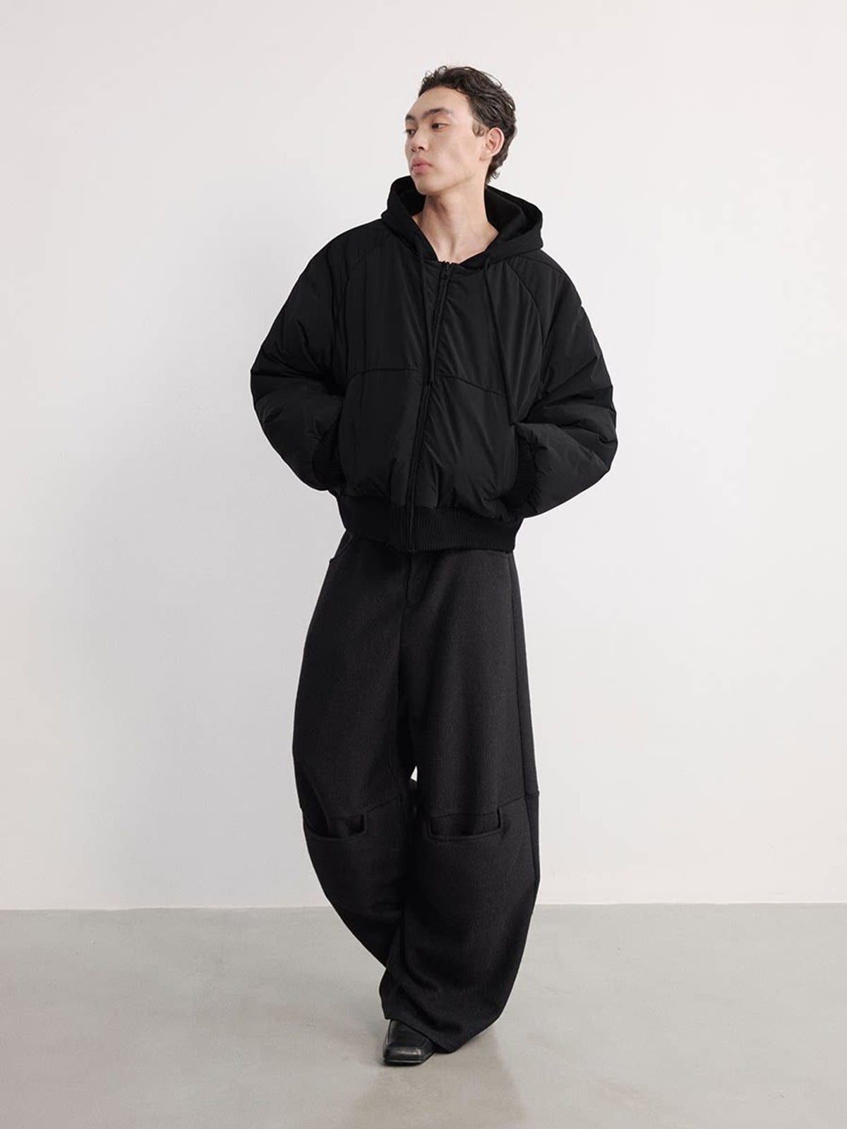 JCAESAR STUDIO Reversible Hooded Nylon Bomber in Black - On Male Model