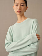 TEASEL Merino Wool Crewneck Sweatshirt in Mint - On Female Model