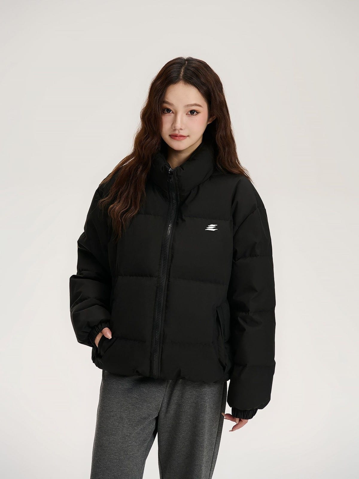 LOSTCTRL 90 White Duck Down Puffer Jacket in Black - On Female Model