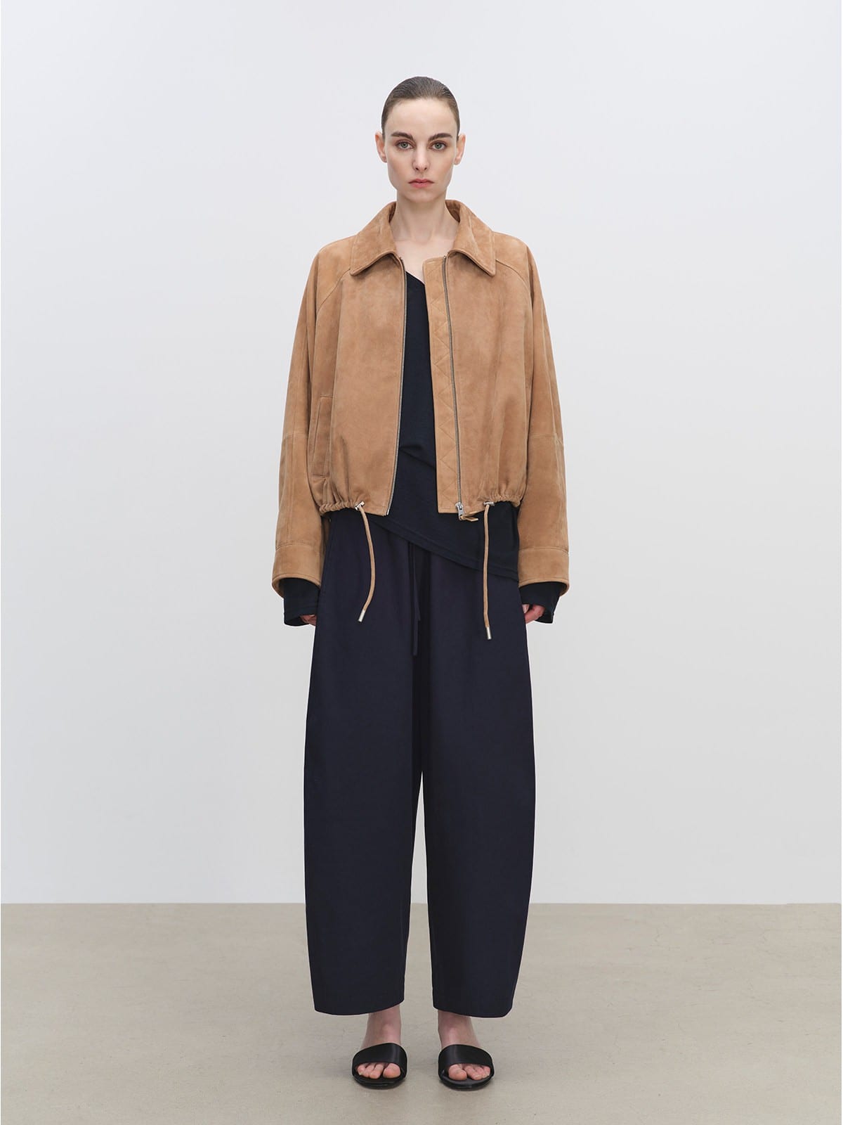MSBEAST Cropped Leather Drawstring Jacket in Beige - On Female Model