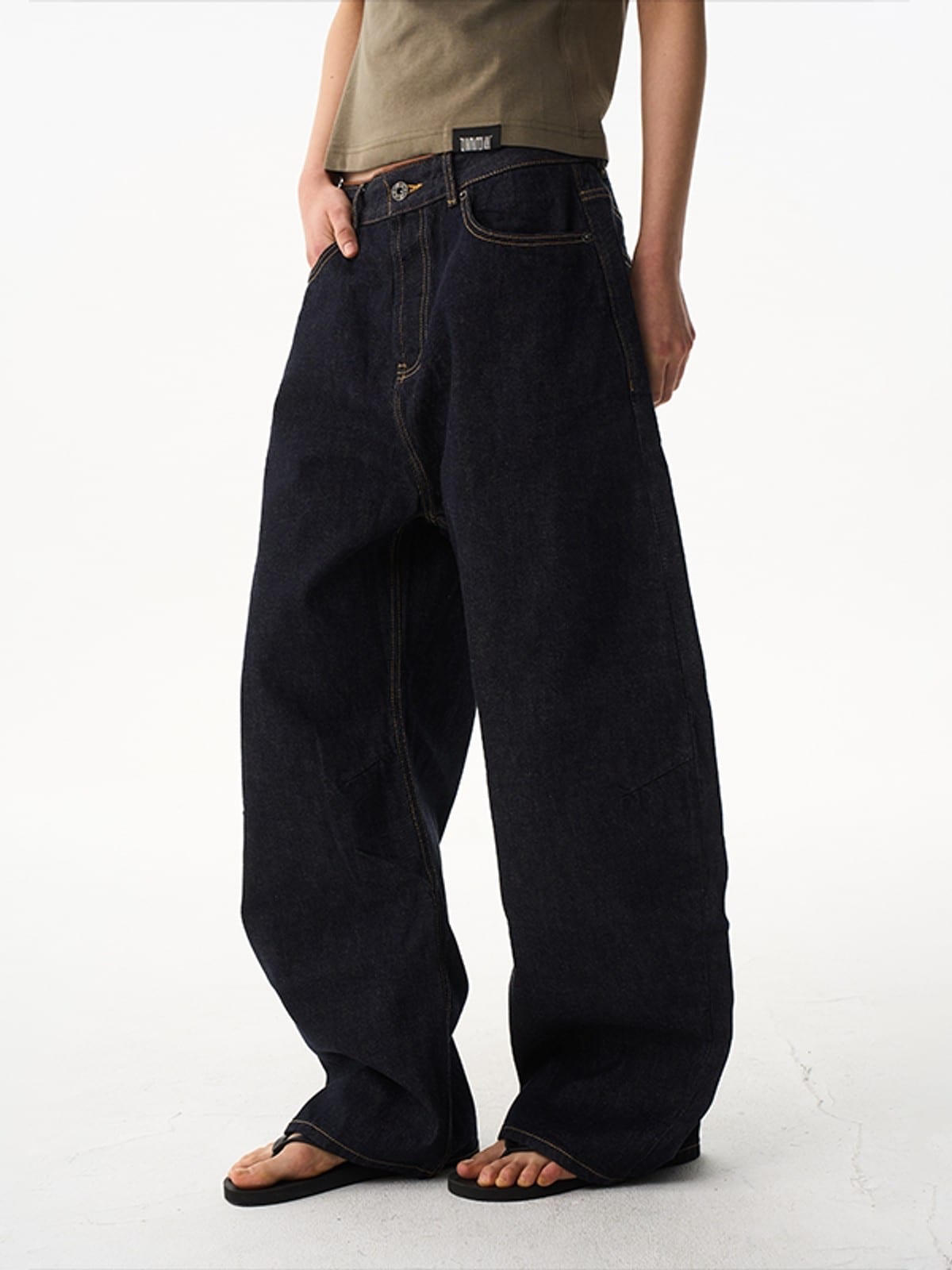 BLINDNOPLAN Curved Wide Leg Raw Denim Jeans in Denim - On Model