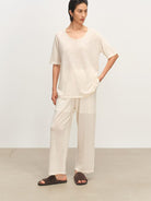 MSBEAST Melange Wool Linen Scoop Neck T Shirt in White - On Female Model