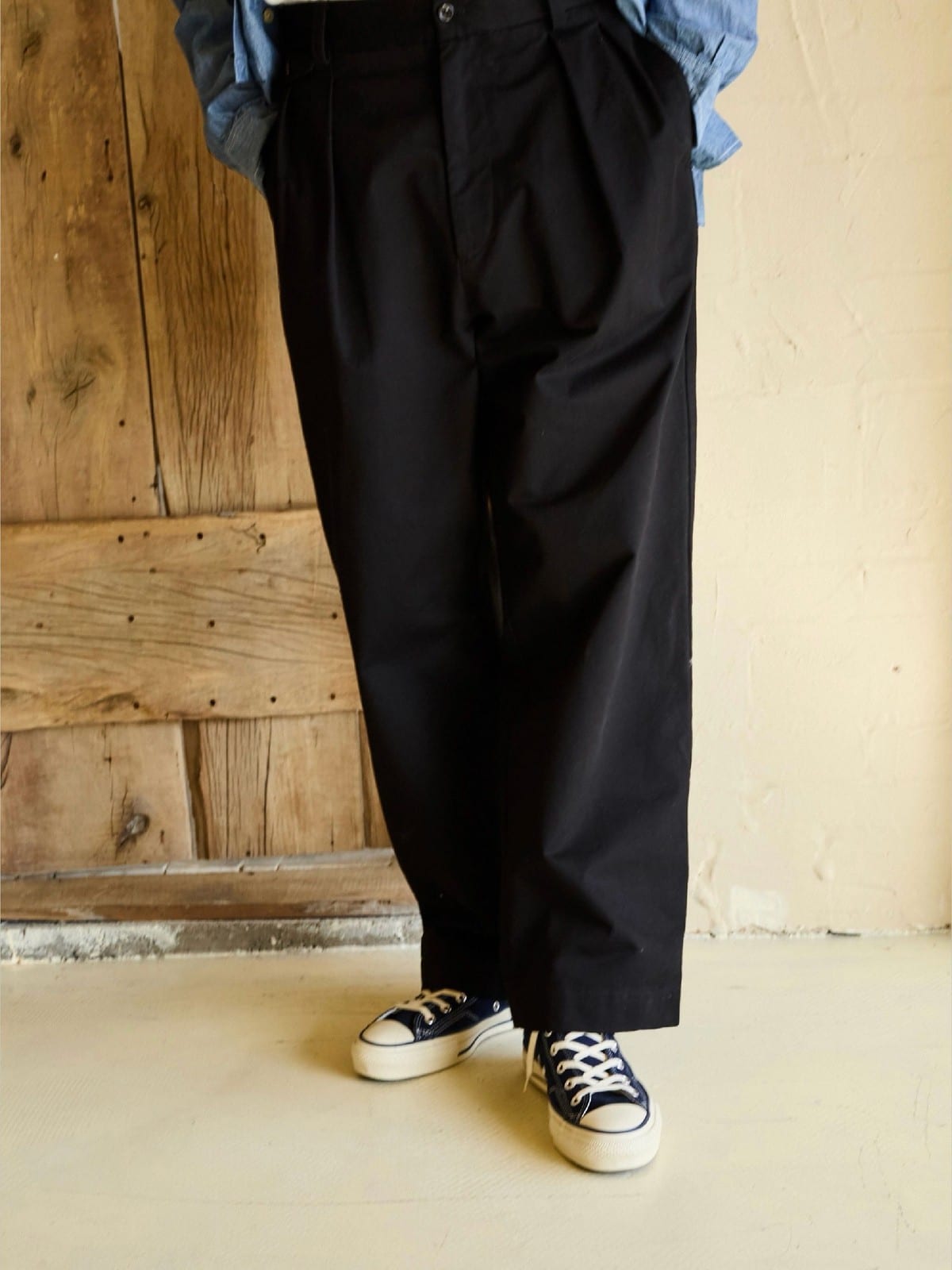USAGE Pleated Cotton Twill Chinos in Black - On Model