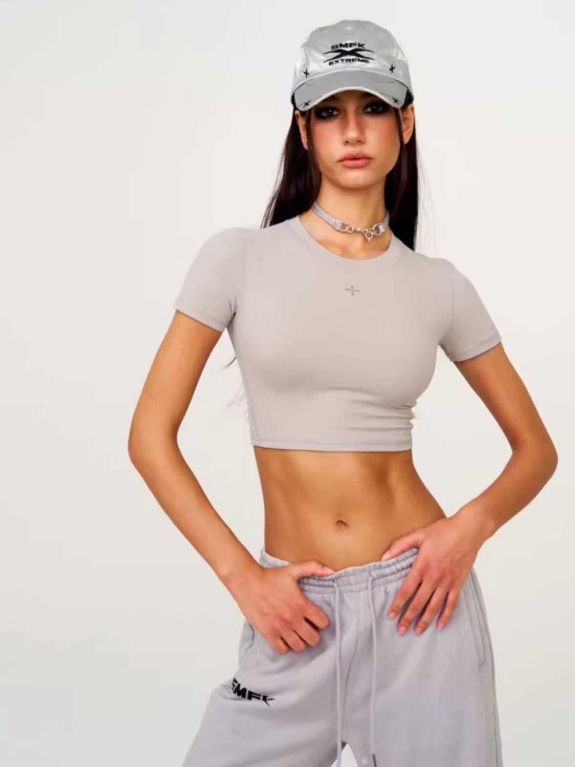 SMFK Distressed Cross Embroidered Baseball Cap in Gray - On Female Model