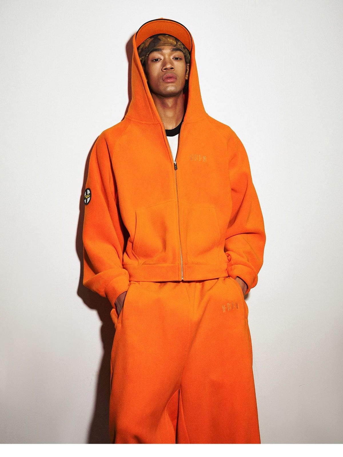 MEDM Polar Fleece Zip Up Hoodie in Orange - On Male Model