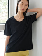 MSBEAST Rolled Edge Silk Cotton U Neck T Shirt in Black - On Female Model