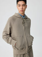 SIMPLE PROJECT Cotton Blend Zip Up Hoodie in Beige - On Male Model