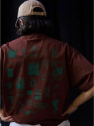 USAGE JZ Festival Graphic Cotton T Shirt in Brown - On Model