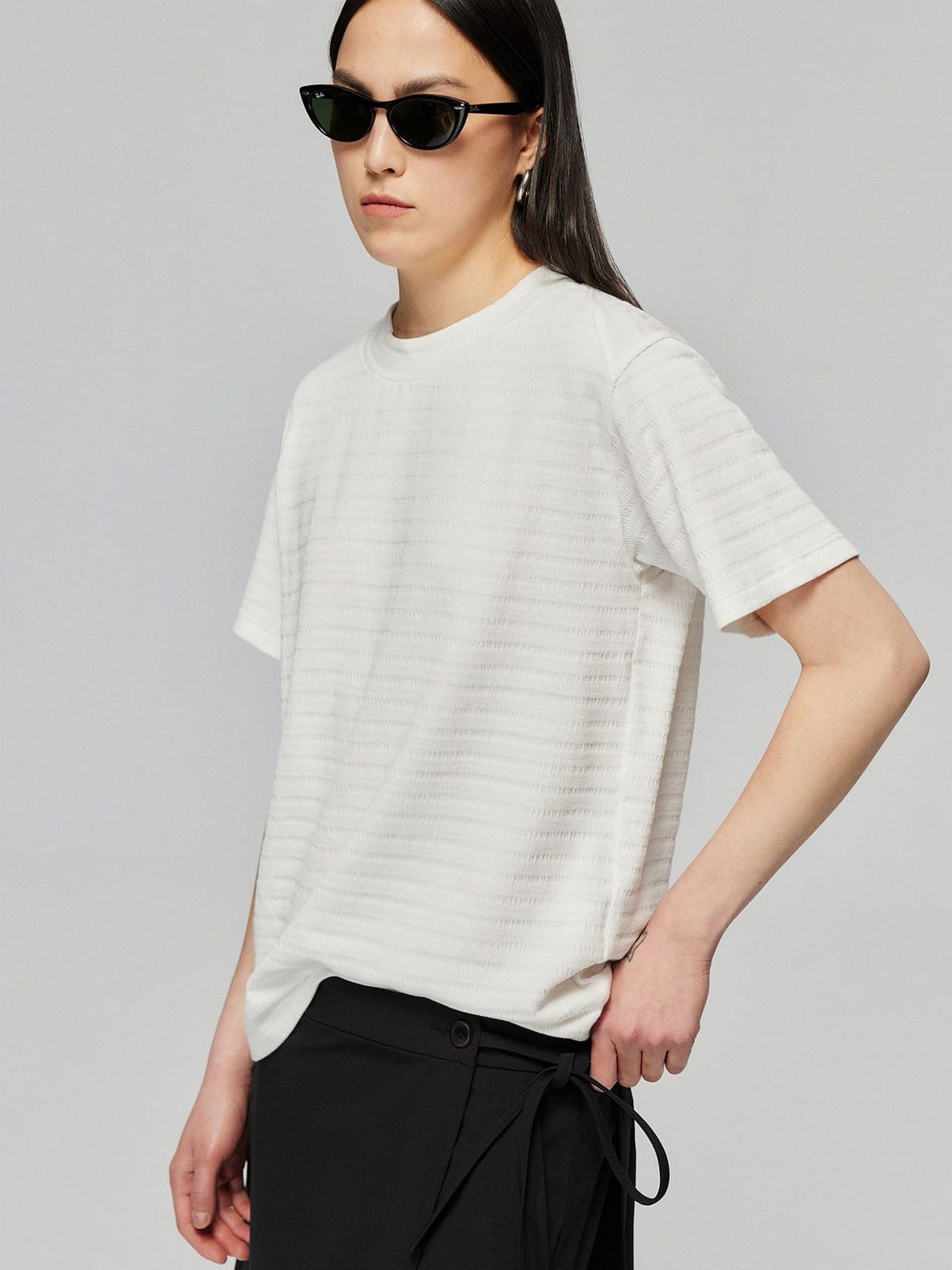 SIMPLE PROJECT Textured Diagonal Paneled T Shirt in White - On Female Model