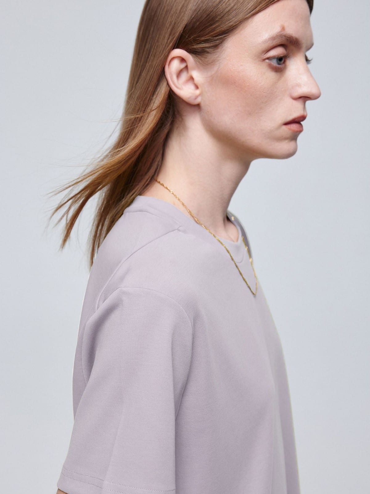 SIMPLE PROJECT Misaligned Seam Crewneck T Shirt in Lavender - On Female Model