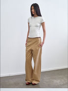 RARELY ALIKE Hourglass Cotton Crew Neck T Shirt in White - On Female Model