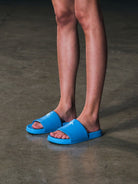 SMFK Leather Cross Detail Slide Sandals in Blue - On Model