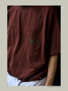 USAGE JZ Festival Graphic Cotton T Shirt in Brown - On Model
