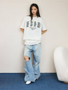 MEDM Pearl Embellished Letter Cotton T Shirt in White - On Female Model