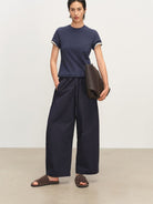 MSBEAST Cotton Blend Tapered Waist T Shirt in Navy Blue - On Female Model