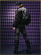 MEDM JoJo Collab Graphic Puffer Bomber in Black - On Male Model
