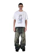 UNKNOWNWORLD Heavyweight Distressed Wide Leg Jeans in Denim - On Male Model